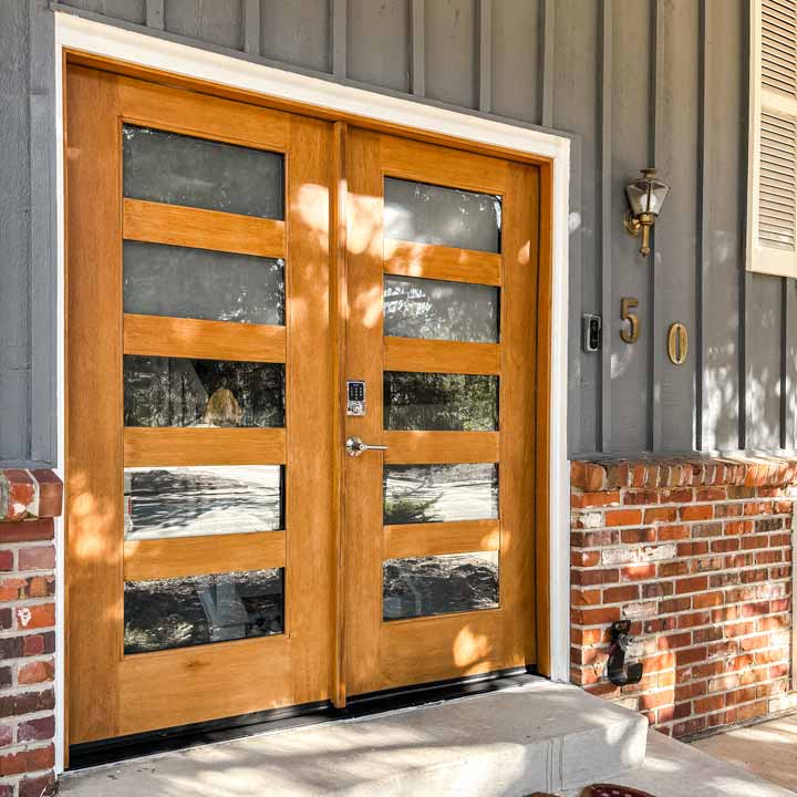 New front entry door installation with glass panels